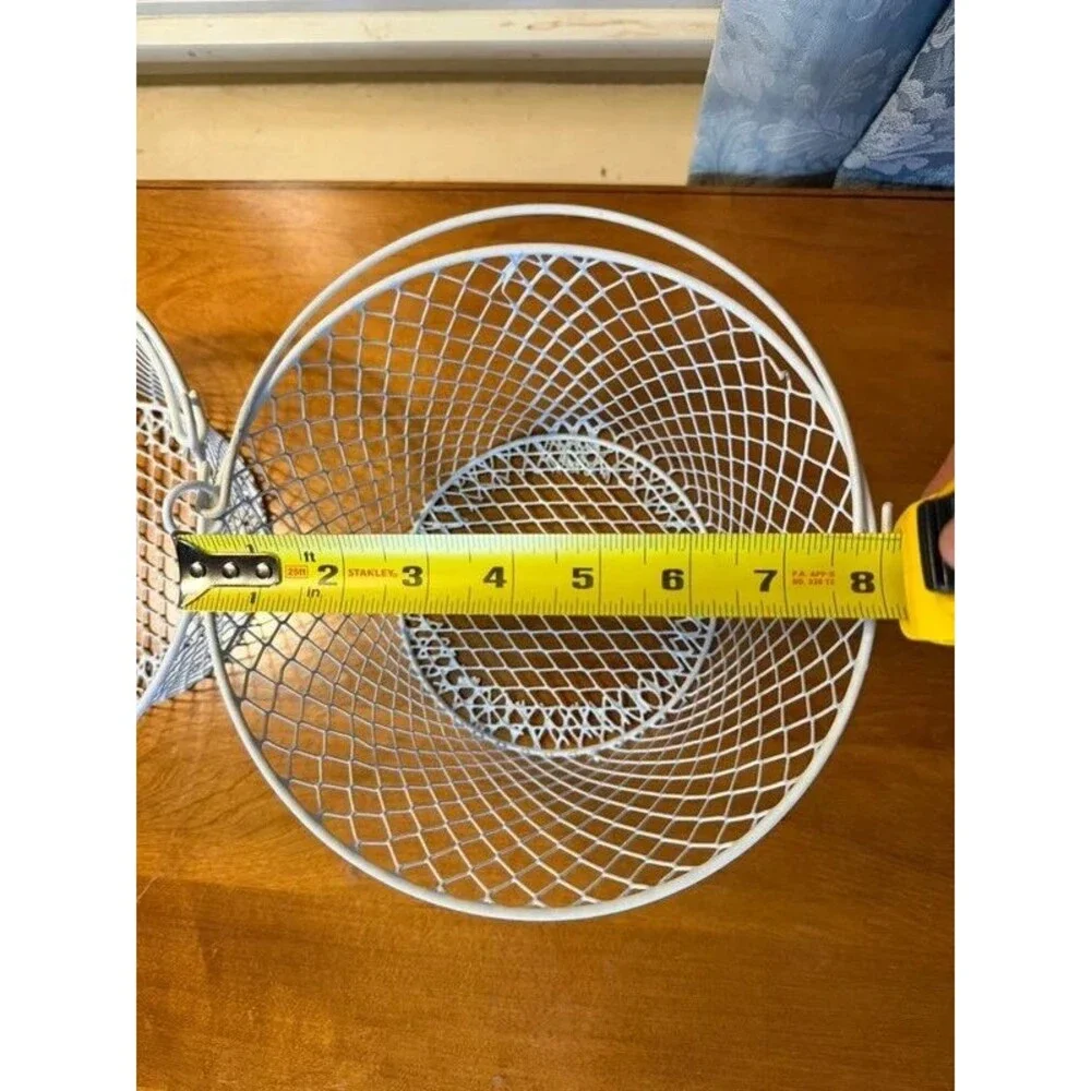 White wire mesh baskets with handles